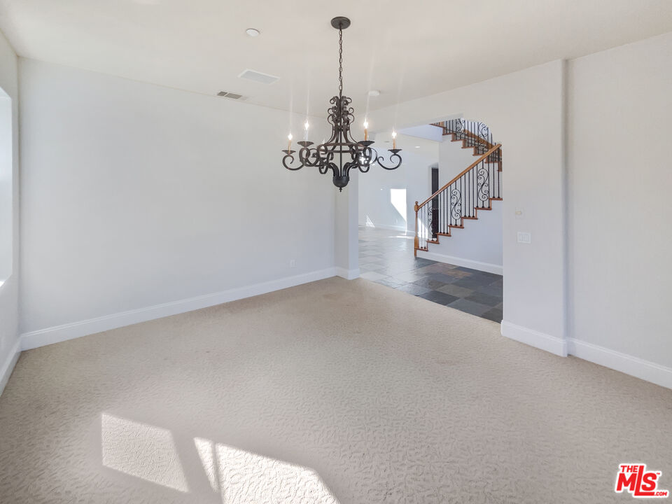 3946 Whistle Train Road Brea, CA 92823 - Photo 10 of 34 a view of a chandelier in big room and chandelier