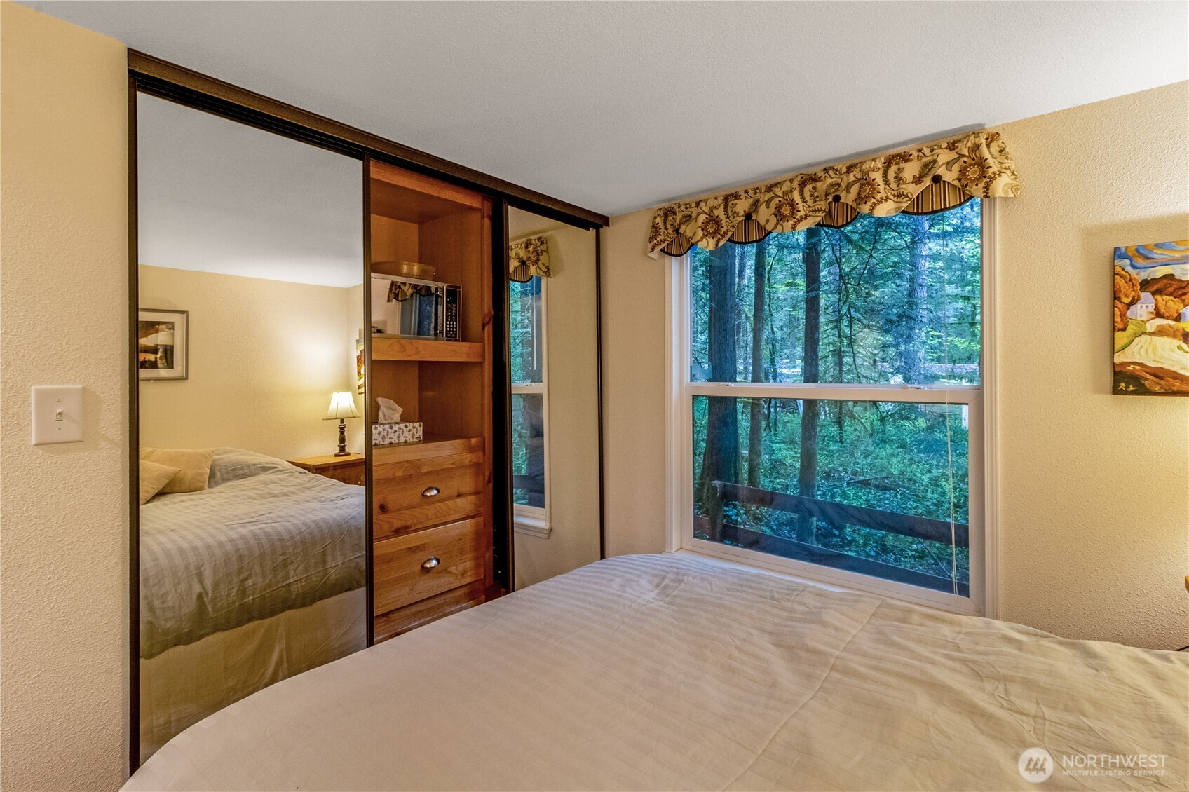 86-3 Sunset Circle Maple Falls, WA 98266 - Photo 16 of 38 a bedroom with a bed and large window