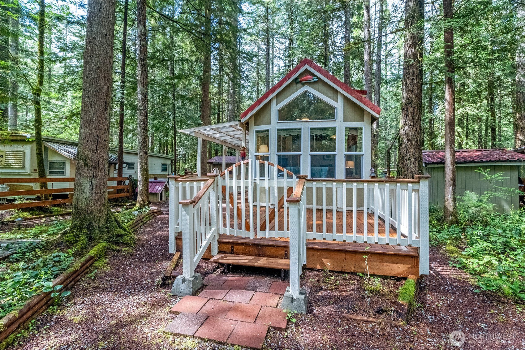86-3 Sunset Circle Maple Falls, WA 98266 - Photo 2 of 38 a view of a small deck with a yard
