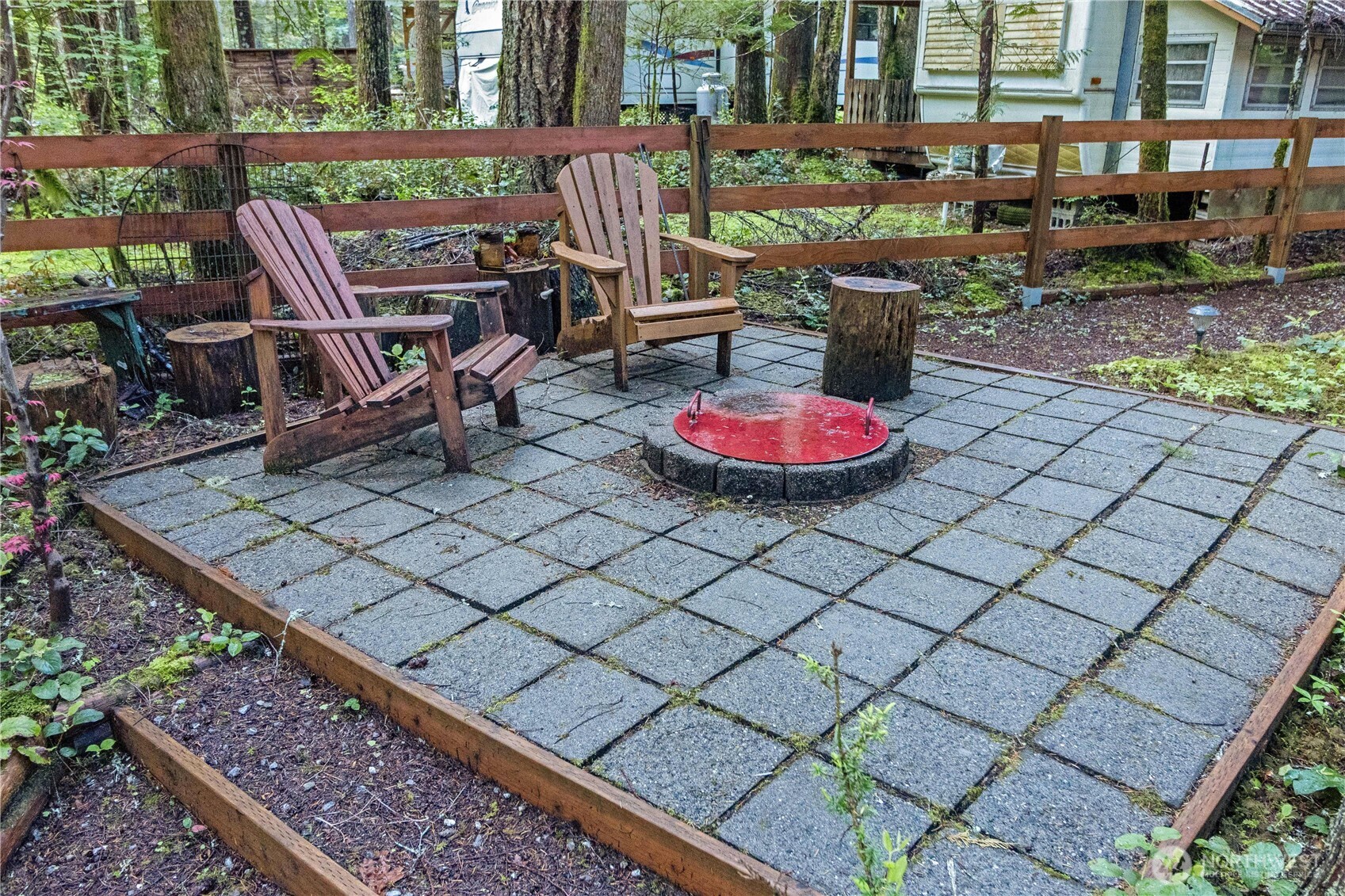 86-3 Sunset Circle Maple Falls, WA 98266 - Photo 28 of 38 a view of a backyard with sitting area