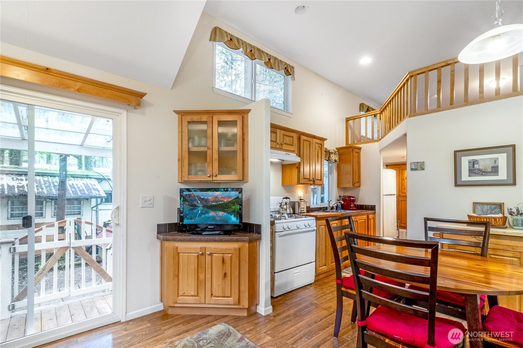 86-3 Sunset Circle Maple Falls, WA 98266 - Photo 7 of 38 a living room with furniture a wooden floor and a chandelier