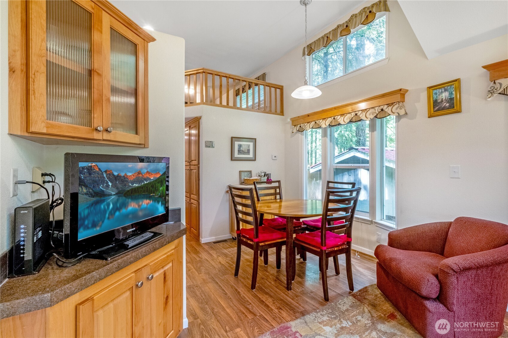 86-3 Sunset Circle Maple Falls, WA 98266 - Photo 8 of 38 a living room with furniture a flat screen tv and a floor to ceiling window