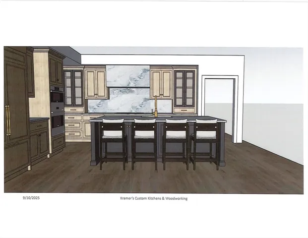 a kitchen with a table and chairs