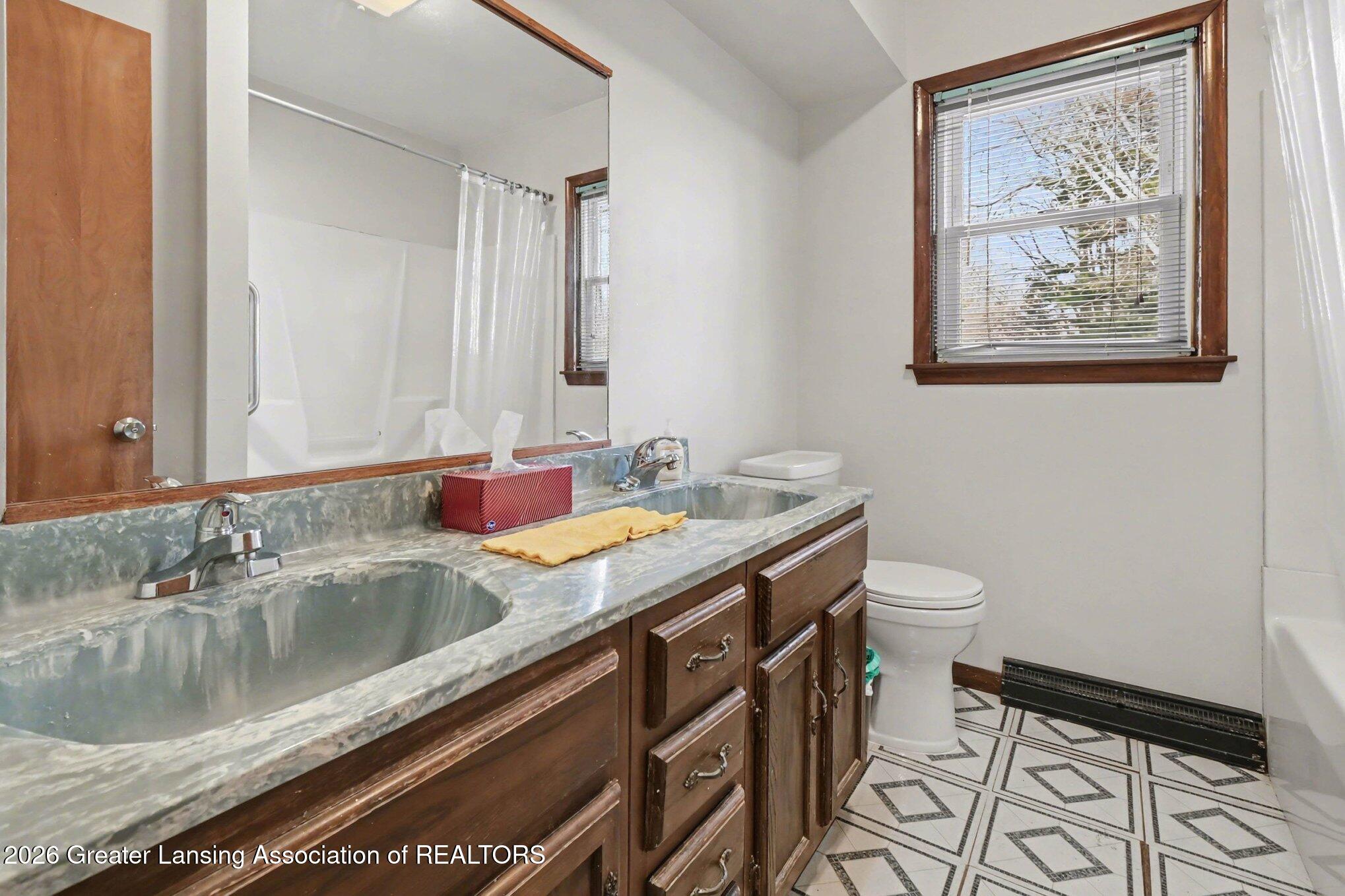6253 Hilliard Road Lansing, MI 48911 - Photo 19 of 28 019_file_3999