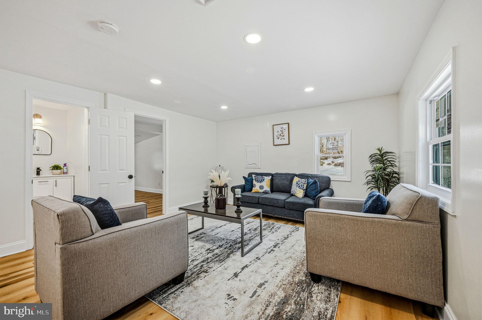 4 Lower Greenbriar Road Wilmington, DE 19810 - Photo 14 of 42 a living room with furniture and a couch