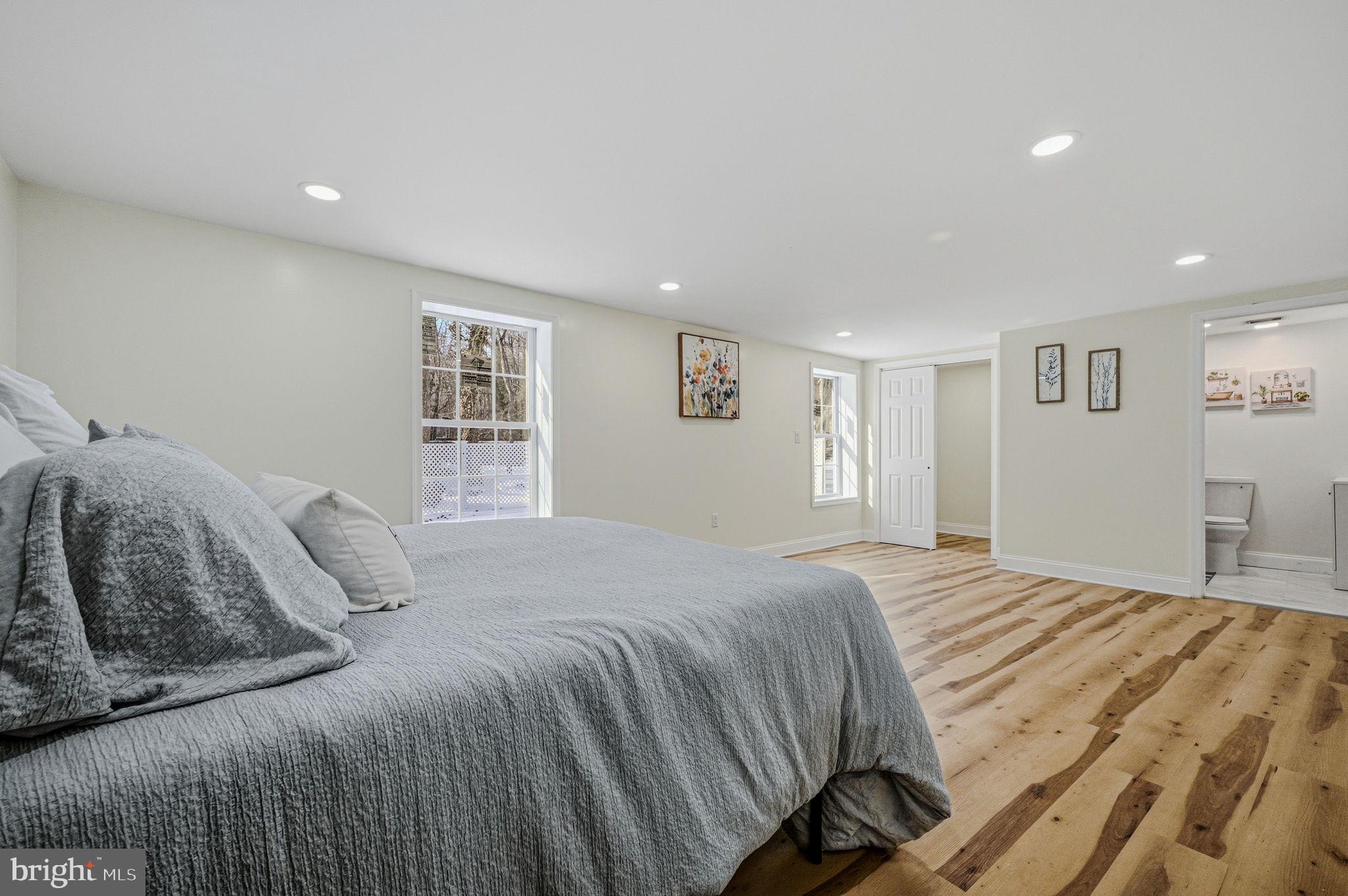 4 Lower Greenbriar Road Wilmington, DE 19810 - Photo 30 of 42 a bedroom with a large bed and a window