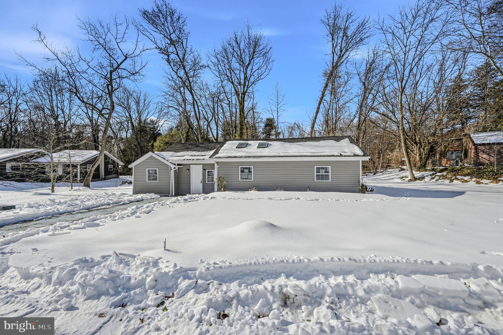 4 Lower Greenbriar Road Wilmington, DE 19810 - Photo 41 of 42 a view of the house with a yard covered in snow