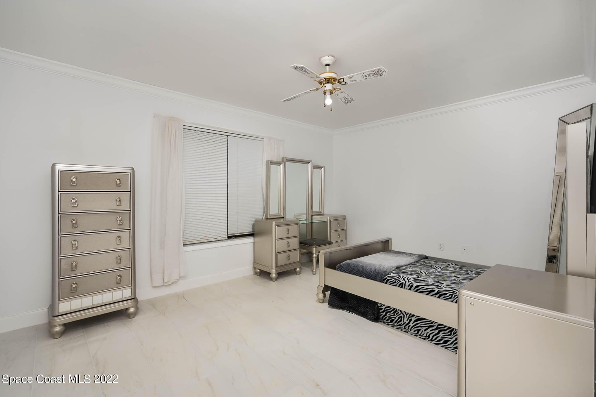 412 Godfrey Road Southeast Palm Bay, FL 32909 - Photo 18 of 22 a living room with furniture and white walls