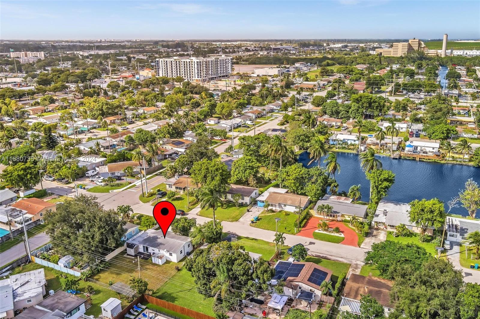 4328 Southwest 49th Court, Unit 2 Dania Beach, FL 33314 - Photo 14 of 18 an aerial view of residential houses with outdoor space