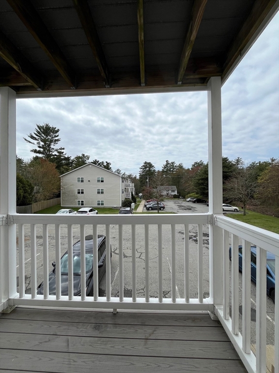 1475 Braley Road, Unit 17 New Bedford, MA 02745 - Photo 2 of 9 a view of balcony with furniture