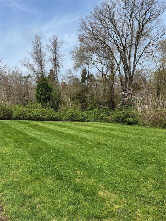 1475 Braley Road, Unit 17 New Bedford, MA 02745 - Photo 8 of 9 a view of outdoor space with green field