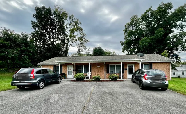 a car parked in front of a house