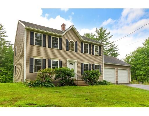 13 Flat Rock Road Petersham, MA 01366 - Photo 2 of 29 a front view of a house with a garden
