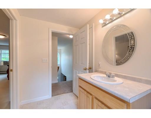 13 Flat Rock Road Petersham, MA 01366 - Photo 22 of 29 a bathroom with a sink mirror and vanity