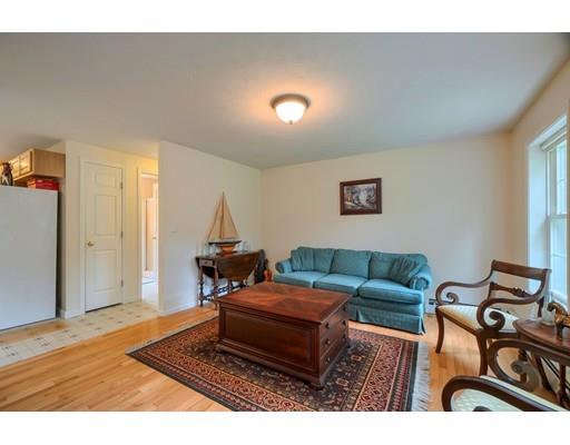 13 Flat Rock Road Petersham, MA 01366 - Photo 4 of 29 a living room with furniture a rug and a window