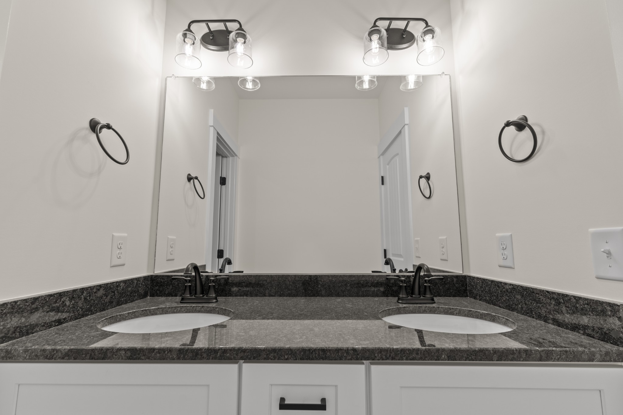2969 Lights Chapel Road Greenbrier, TN 37073 - Photo 24 of 34 a bathroom with a granite countertop sink and a mirror