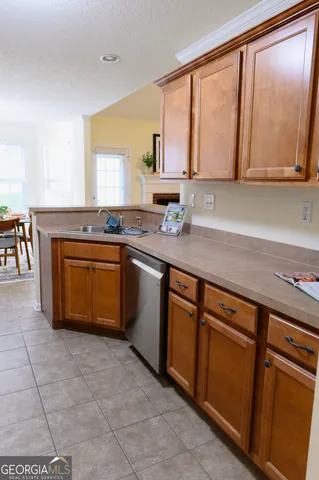a bathroom with a sink a mirror and a window