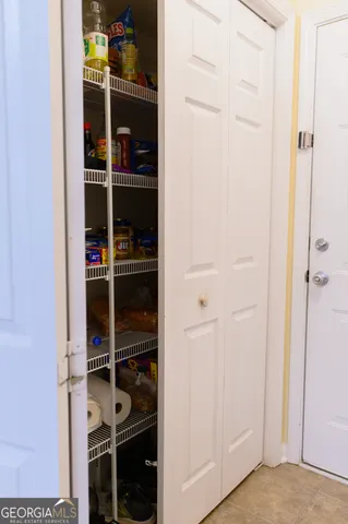 a view of a small space with wooden floor