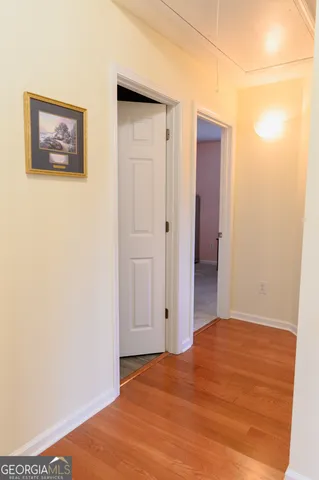 a bedroom with a bed and dresser