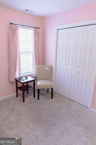 a bathroom with a toilet and a sink