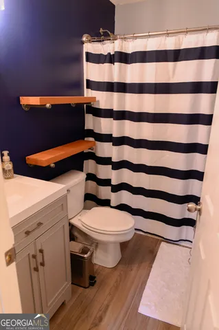 a bedroom with furniture and a bed