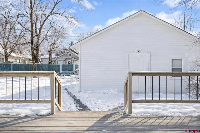 a living room with furniture fireplace and flat screen tv