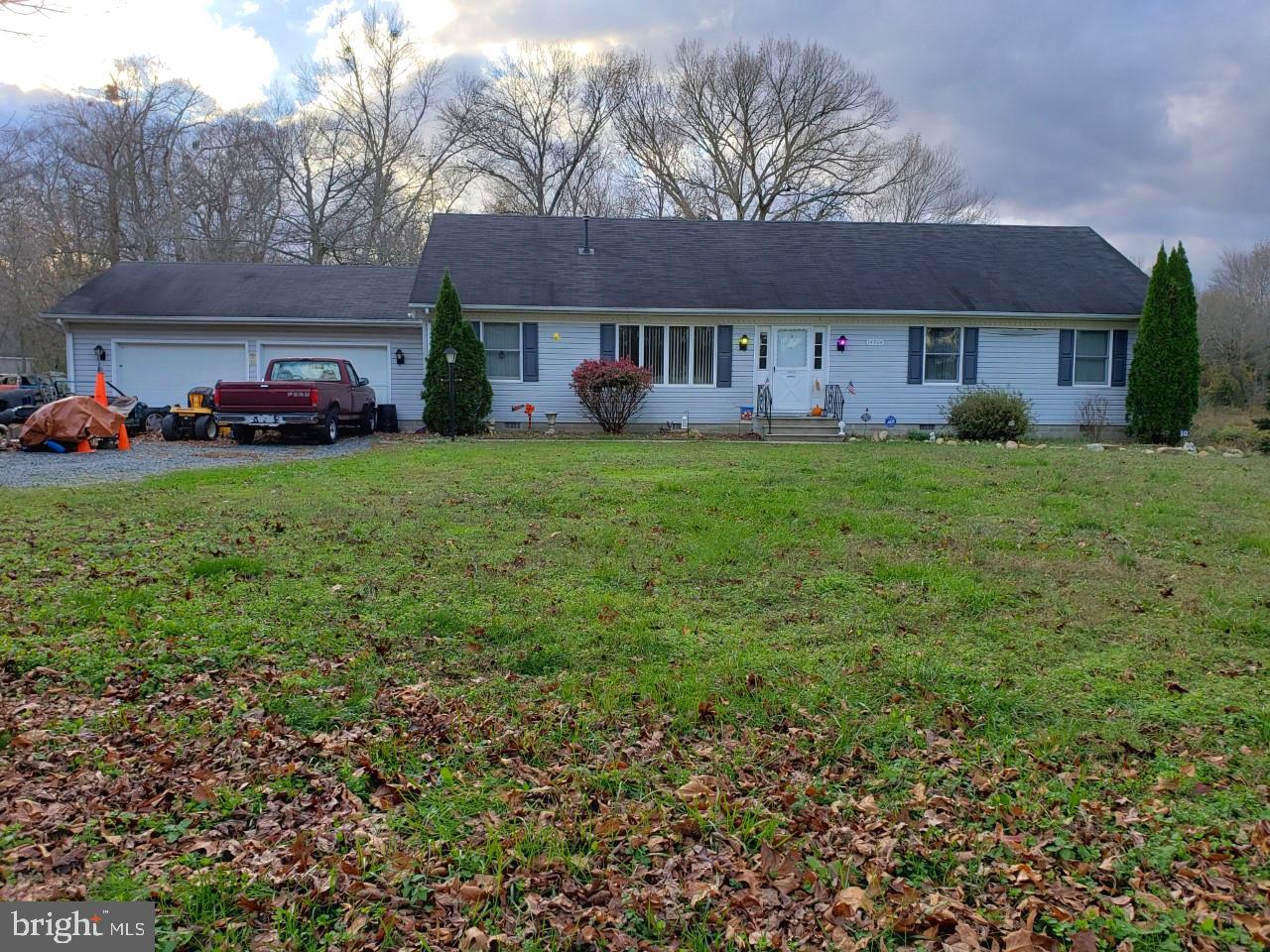 14924 Cherry Lane Ridgely, MD 21660 - Photo 1 of 43 View of the home with 2-car garage
