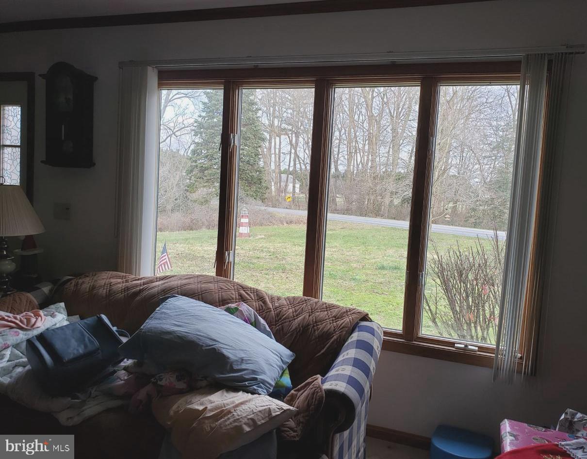 14924 Cherry Lane Ridgely, MD 21660 - Photo 11 of 43 Windows giving lots of light to living room area