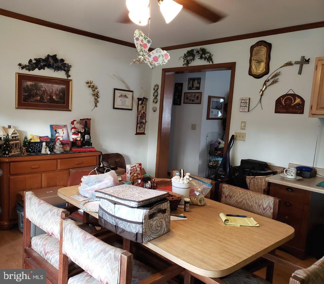 14924 Cherry Lane Ridgely, MD 21660 - Photo 21 of 43 Dining area leading to hall & living room