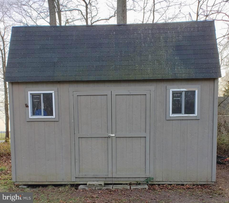 14924 Cherry Lane Ridgely, MD 21660 - Photo 38 of 43 Large storage shed in side yard