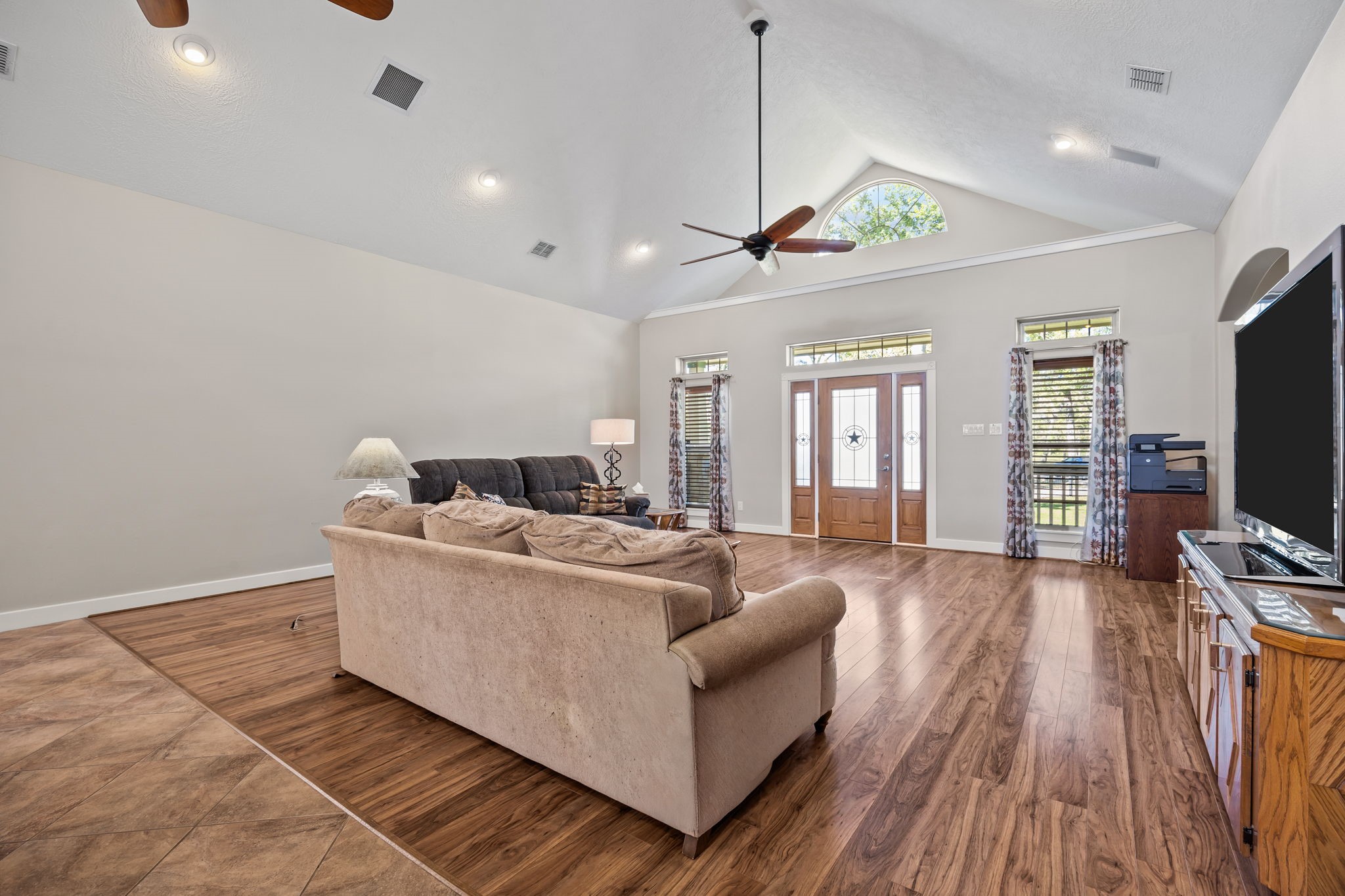 3998 County Road 612 Angleton, TX 77515 - Photo 9 of 47 a living room with furniture and a flat screen tv