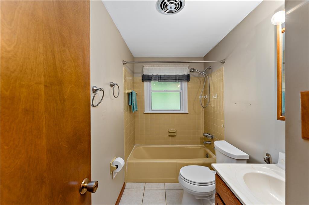 27 Dover Road Irwin, PA 15642 - Photo 19 of 43 a bathroom with a toilet and a sink