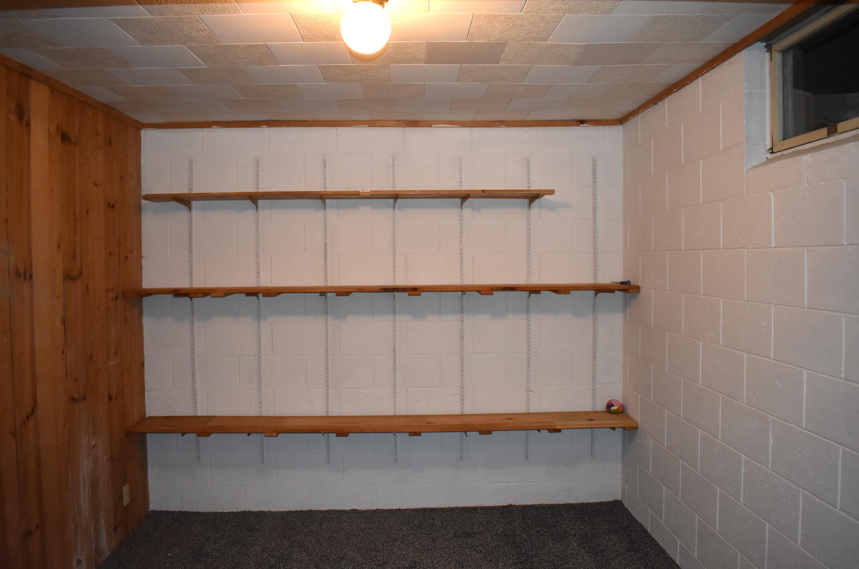 2939 Grant Siding Road Cheboygan, MI 49721 - Photo 34 of 54 Basement Room 1