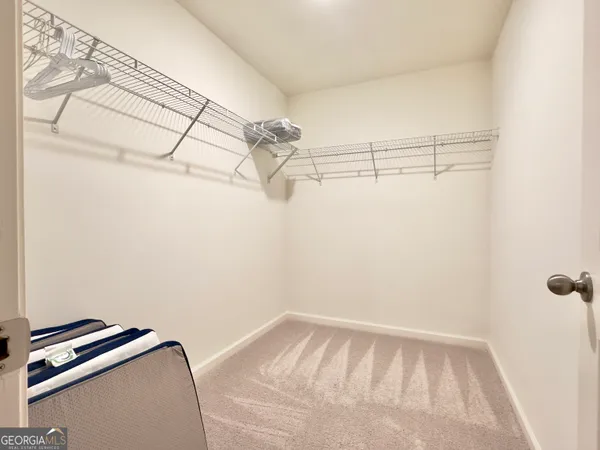 a view of a room with racks on the wall