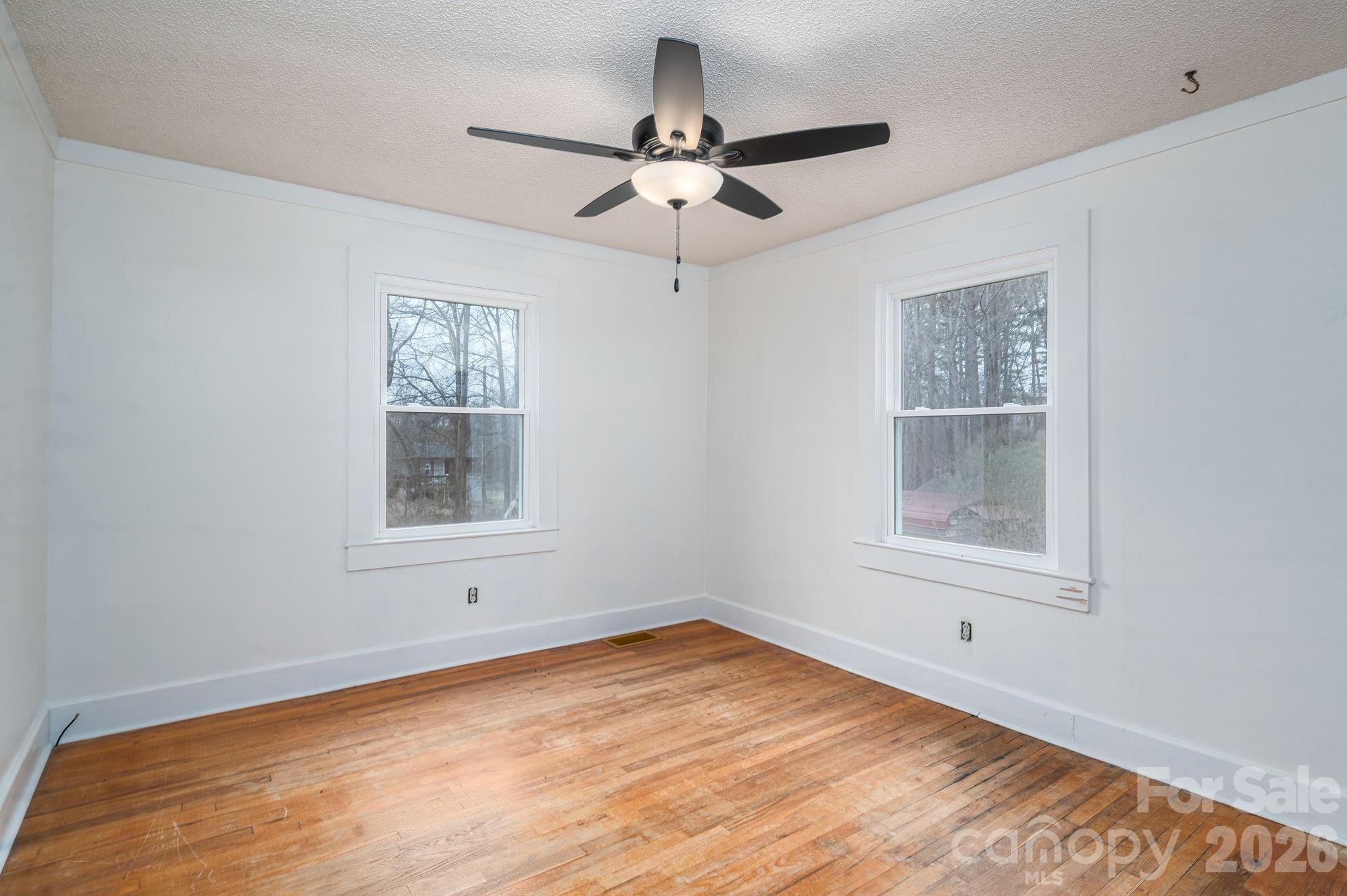 2033 Puetts Chapel Road Bessemer City, NC 28016 - Photo 13 of 38 a view of an empty room with a window