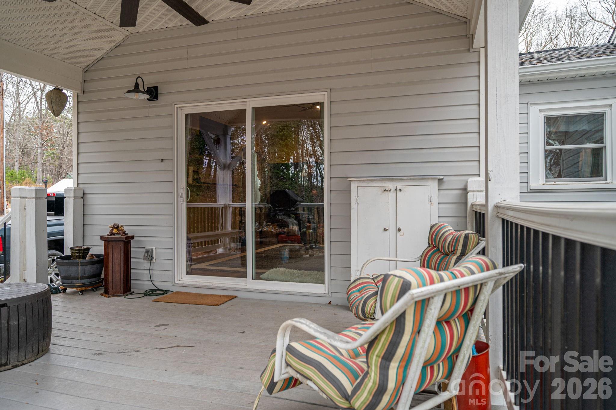 2033 Puetts Chapel Road Bessemer City, NC 28016 - Photo 26 of 38 a backyard of a house with seating space