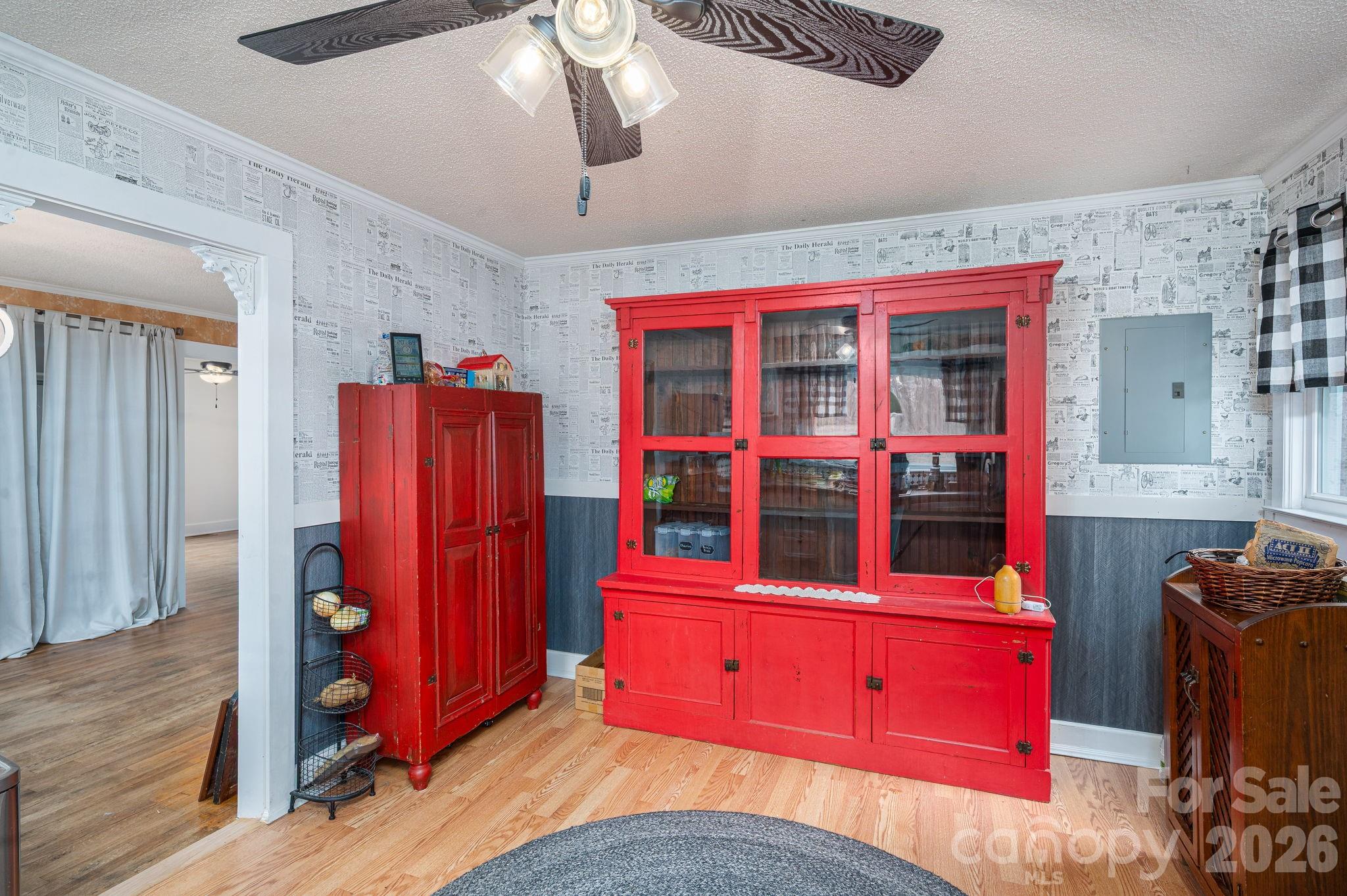 2033 Puetts Chapel Road Bessemer City, NC 28016 - Photo 6 of 38 a view of a bedroom with closet and a ceiling fan