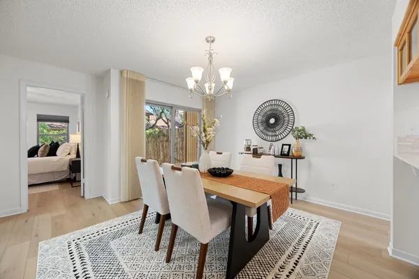 a view of a dining room with furniture window and outside view