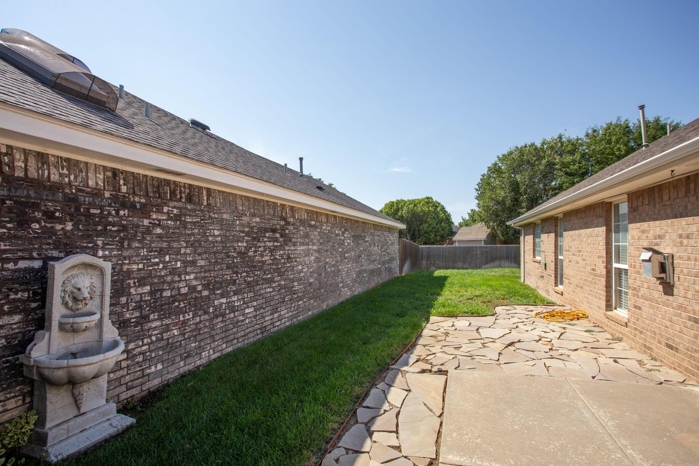 6501 Academy Drive Amarillo, TX 79119 - Photo 21 of 22 a view of a back yard of the house
