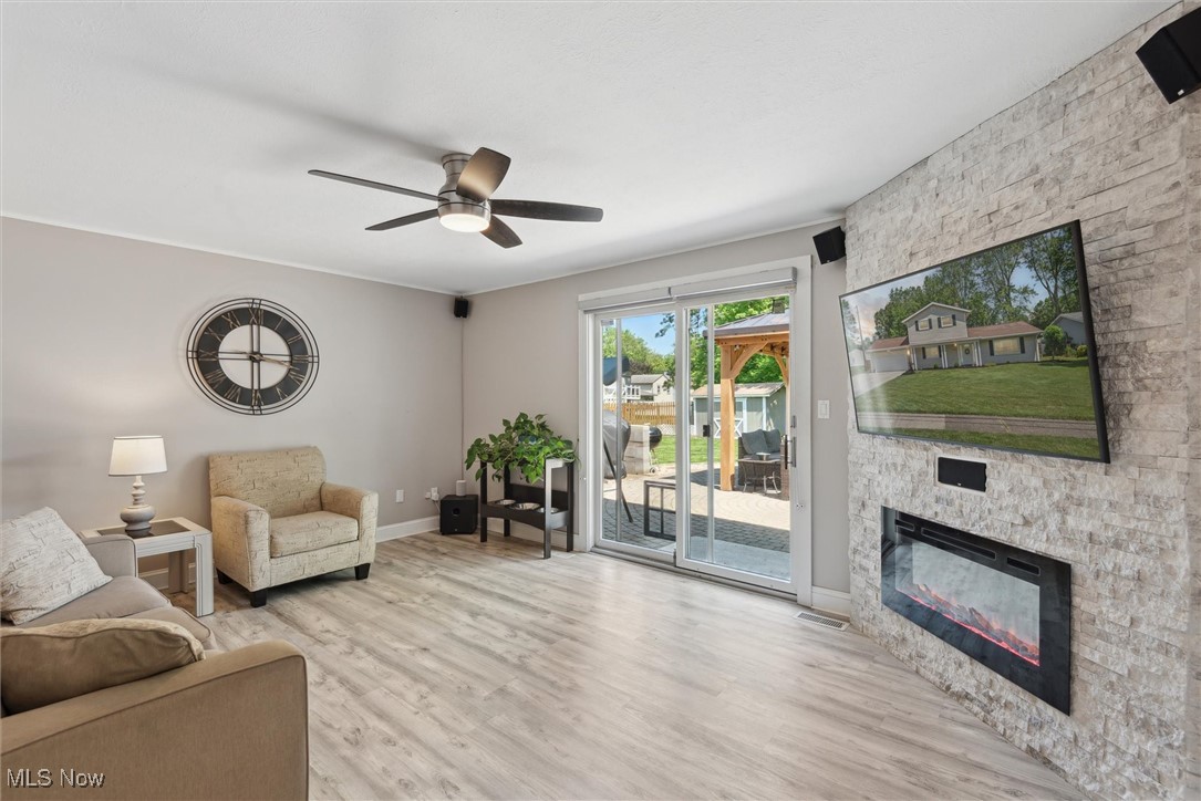 8191 Edgewood Road Mentor, OH 44060 - Photo 19 of 44 Comfort meets function in this updated family room with a gas fireplace and sliders that open to your private outdoor oasis