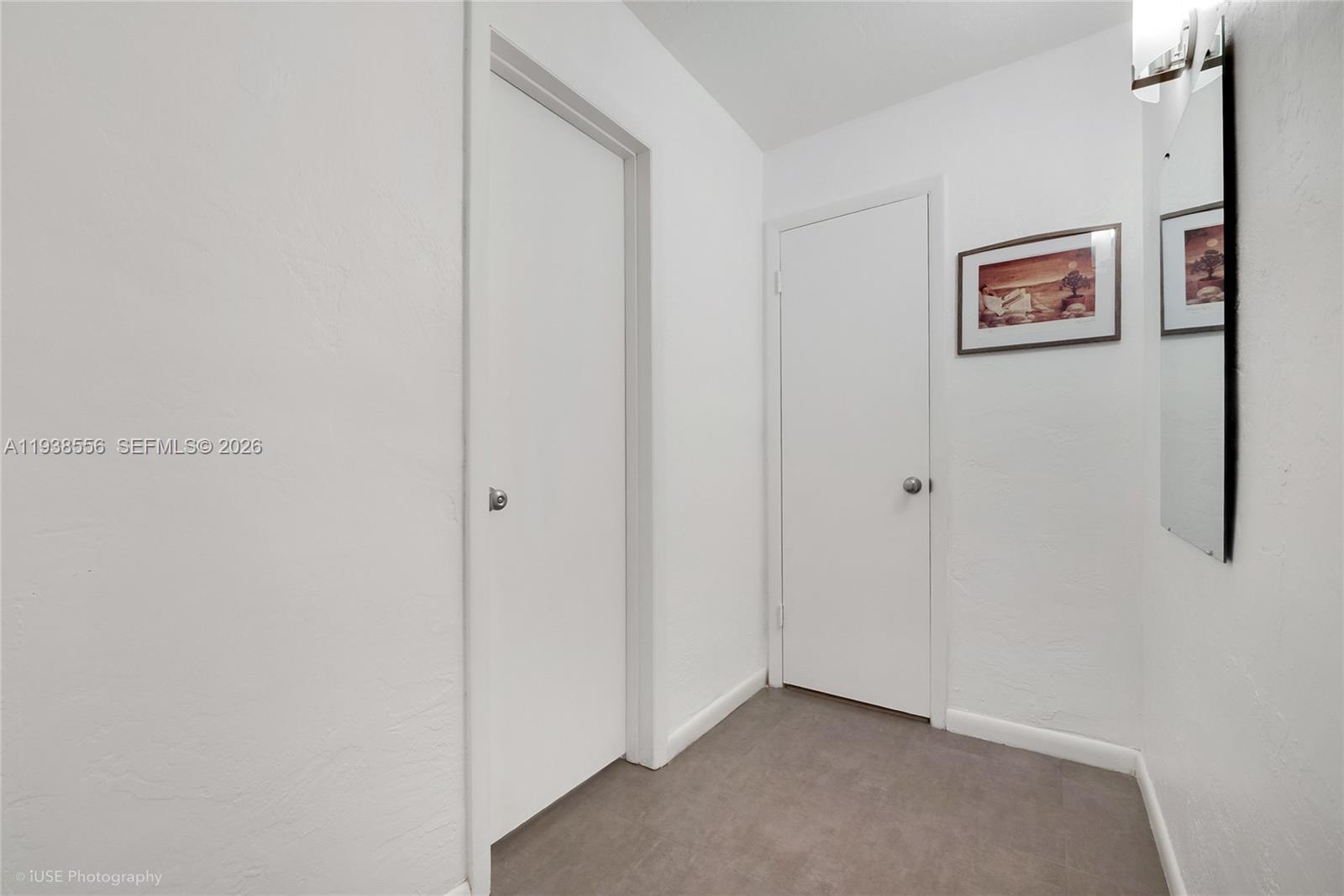 7403 Southwest 82nd Street, Unit 210N Miami, FL 33143 - Photo 11 of 14 a view of a hallway with a elevator