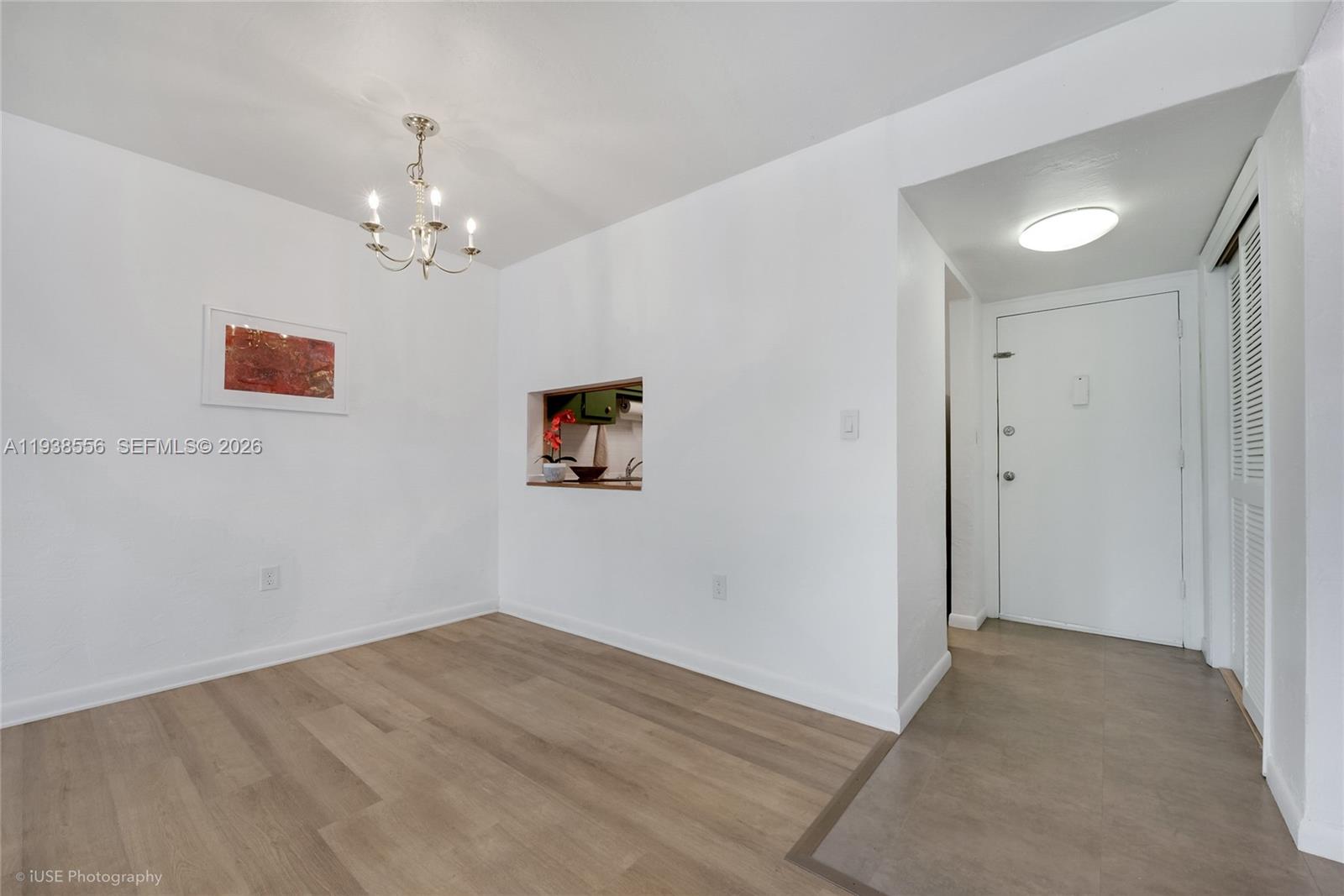 7403 Southwest 82nd Street, Unit 210N Miami, FL 33143 - Photo 2 of 14 wooden floor in an empty room