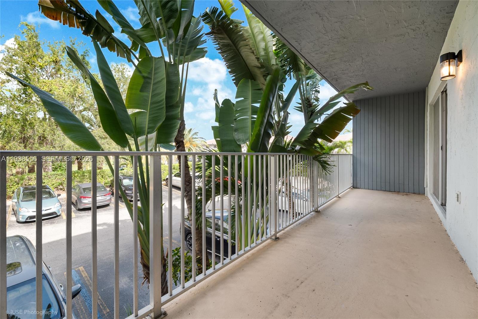 7403 Southwest 82nd Street, Unit 210N Miami, FL 33143 - Photo 8 of 14 a view of a house with backyard and trees