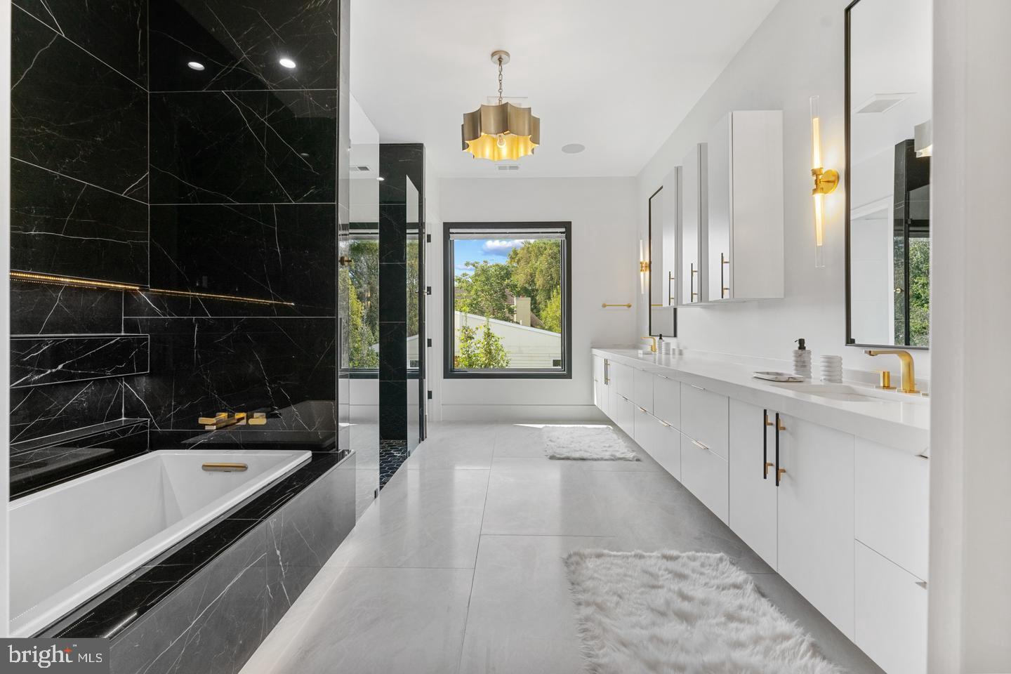 1138 Basil Road McLean, VA 22101 - Photo 16 of 24 Sleek modern bathroom with elegant finishes.