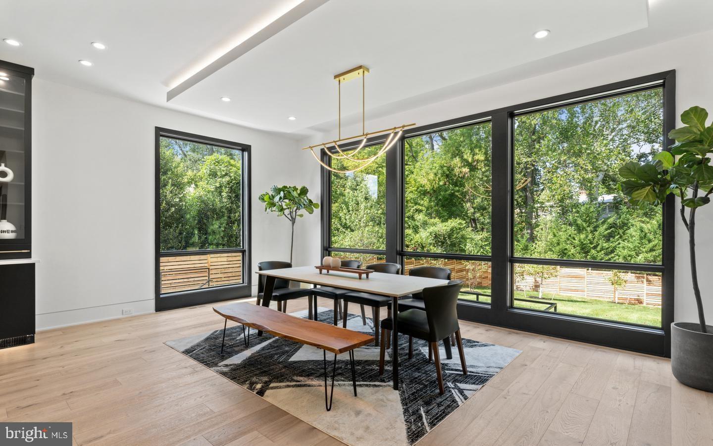 1138 Basil Road McLean, VA 22101 - Photo 9 of 24 Bright dining space with lush views.