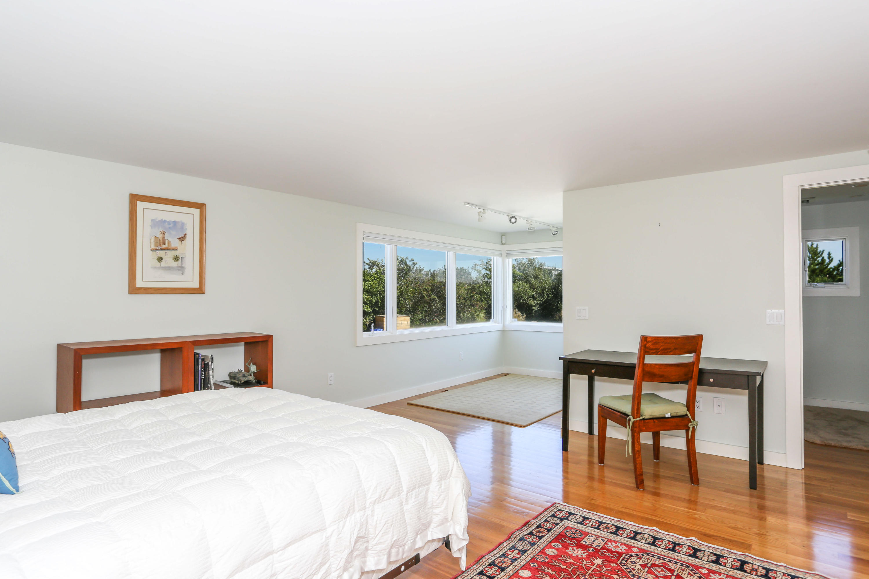 20 Great Hills Road Truro, MA 02666 - Photo 18 of 29 a bedroom with a bed and a table with chair