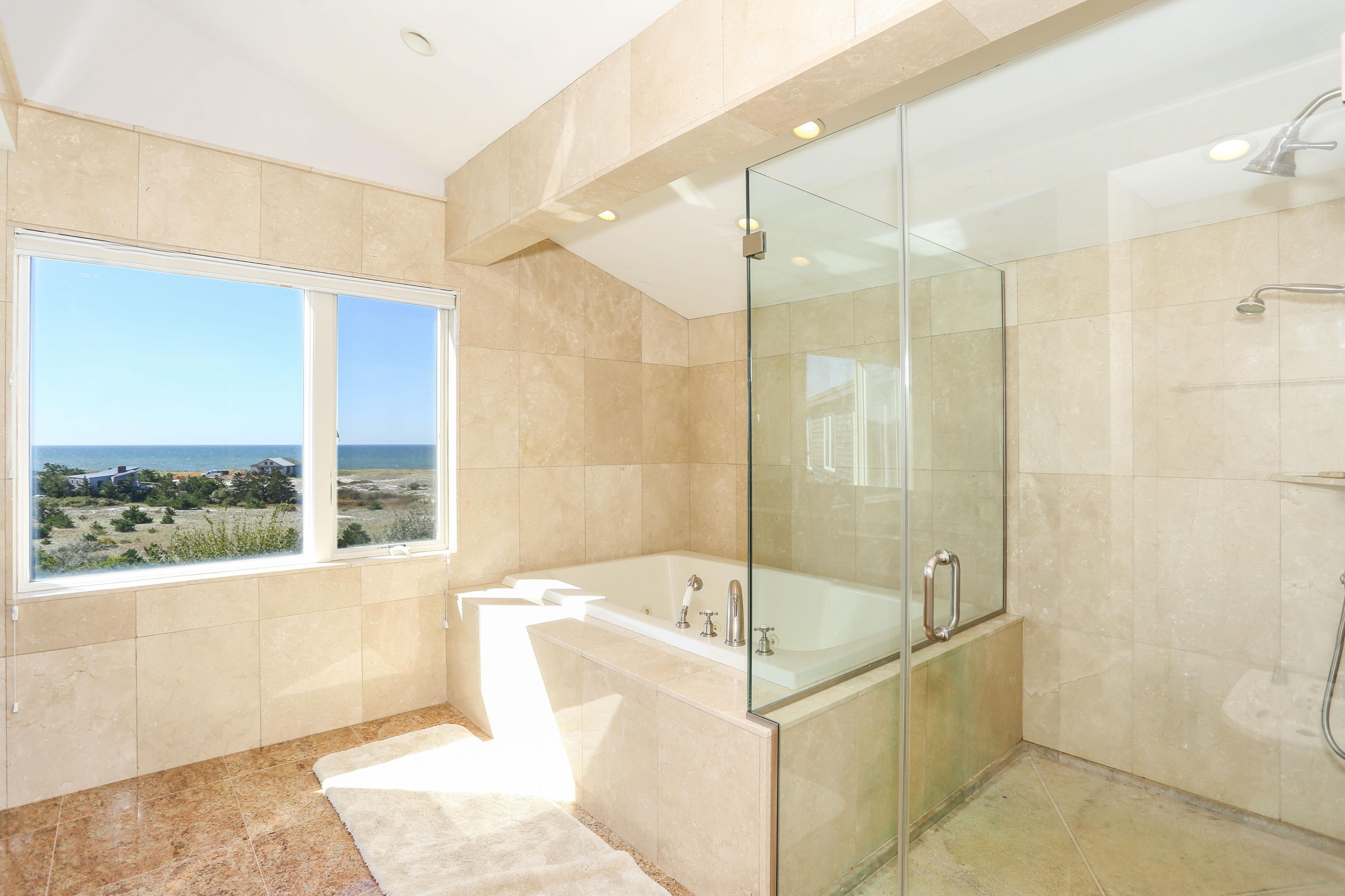 20 Great Hills Road Truro, MA 02666 - Photo 20 of 29 a bathroom with a bathtub and a shower