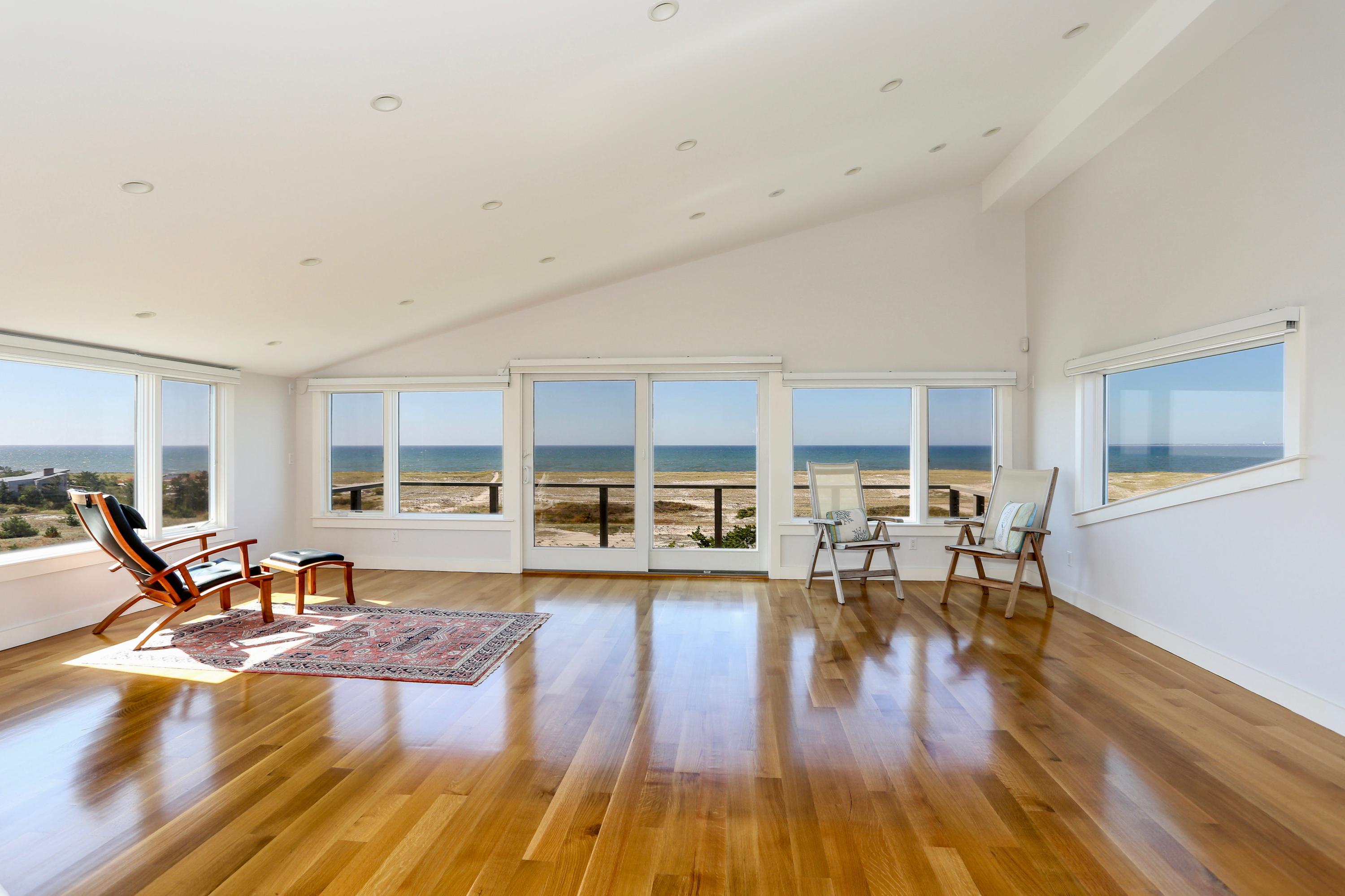 20 Great Hills Road Truro, MA 02666 - Photo 2 of 29 a living room with furniture and a wooden floor