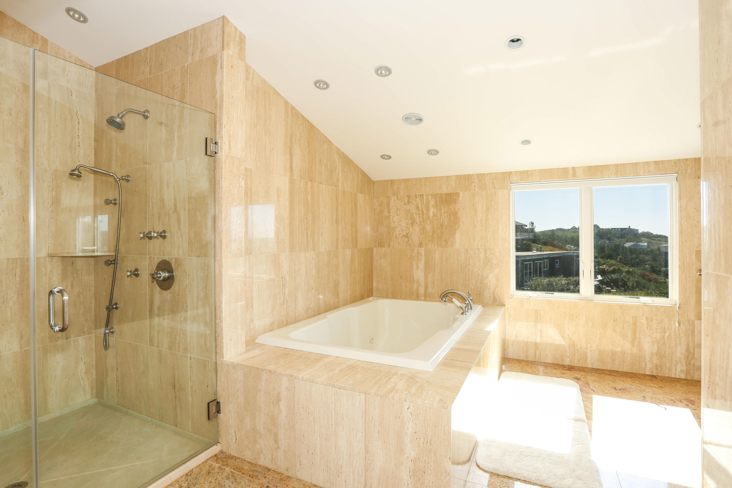 20 Great Hills Road Truro, MA 02666 - Photo 23 of 29 a bathroom with a tub and shower