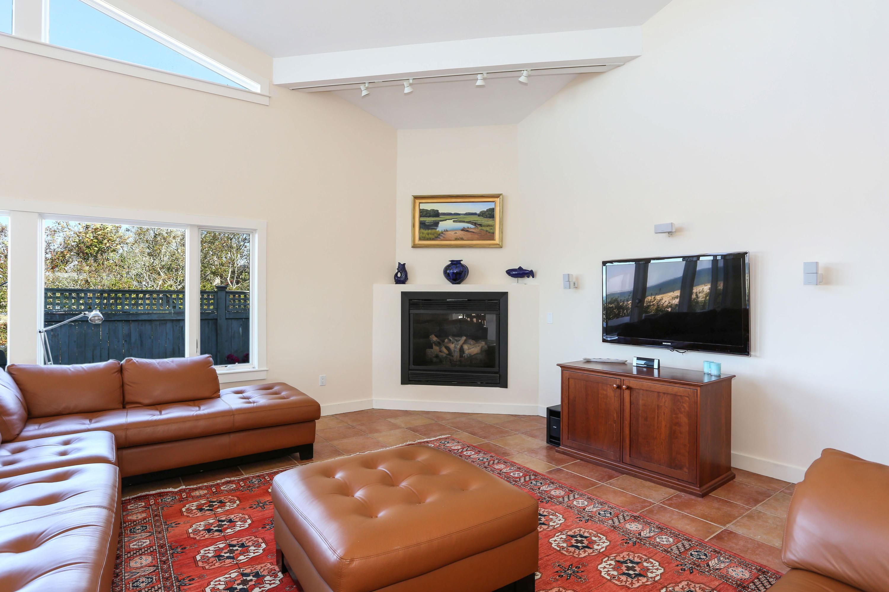 20 Great Hills Road Truro, MA 02666 - Photo 4 of 29 a living room with furniture and a flat screen tv